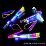 Dozen Light Up LED Slingshot Style Flying Helicopter Toy